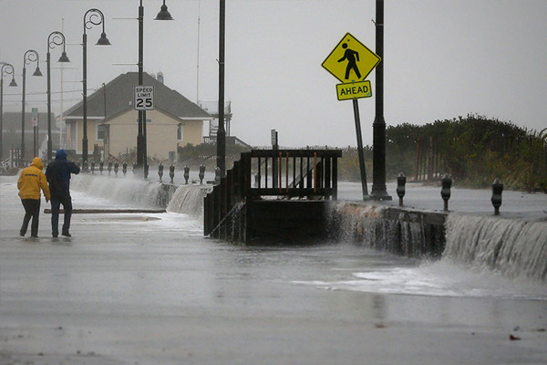 صور إعصار ساندي في امريكا ونيسان وإنفنتي يعرضان أسعار خاصه وتسهيلات لإستبدال السيارت المحطمة 111