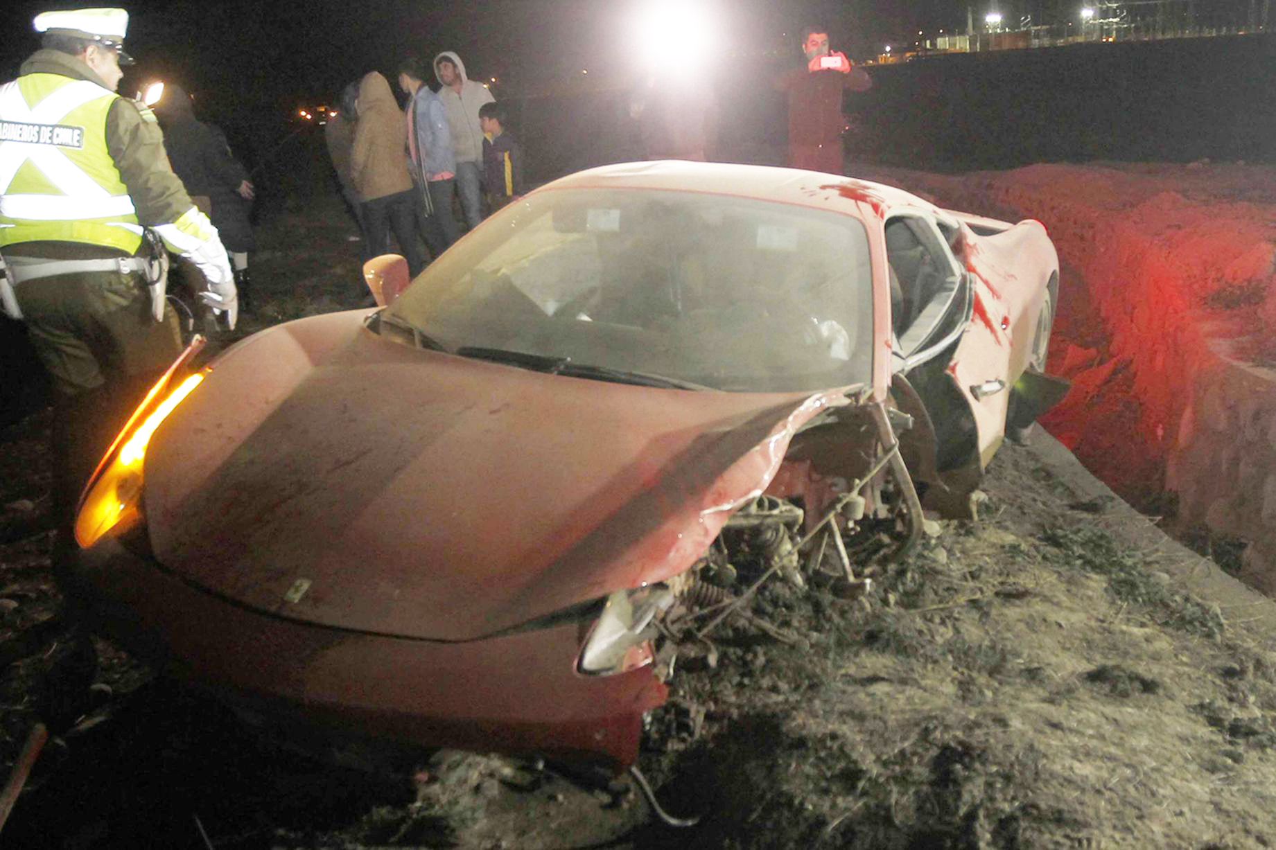 A-red-Ferrari-belonging-to-Arturo-Vidal-is-seen-after-a-car-crash-on-a-highway-south-of-Santiago (1)