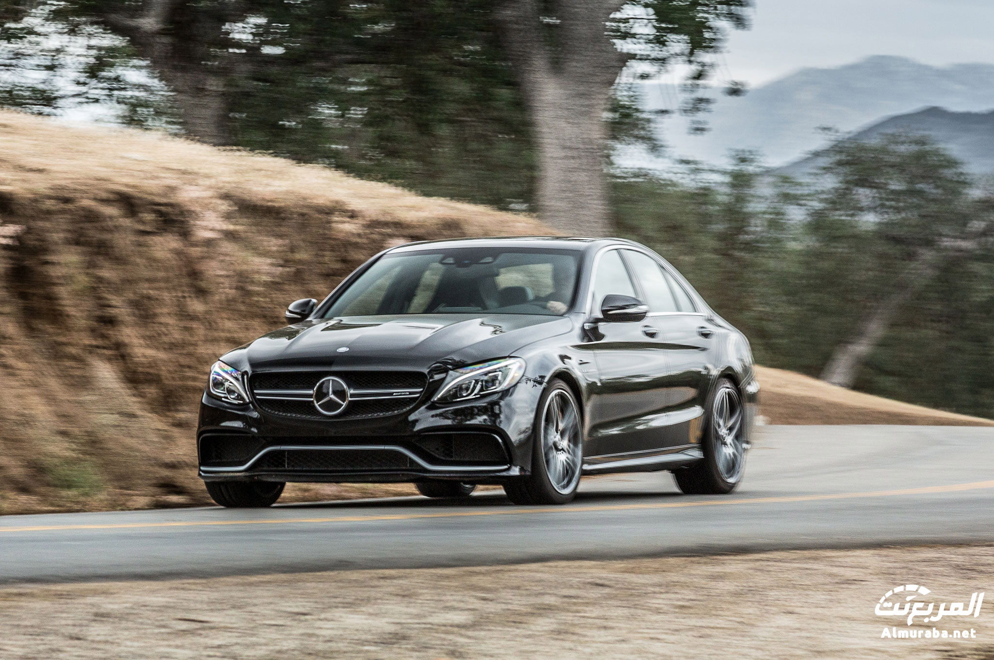 2015-mercedes-amg-c63-s-front-three-quarter-in-motion-03
