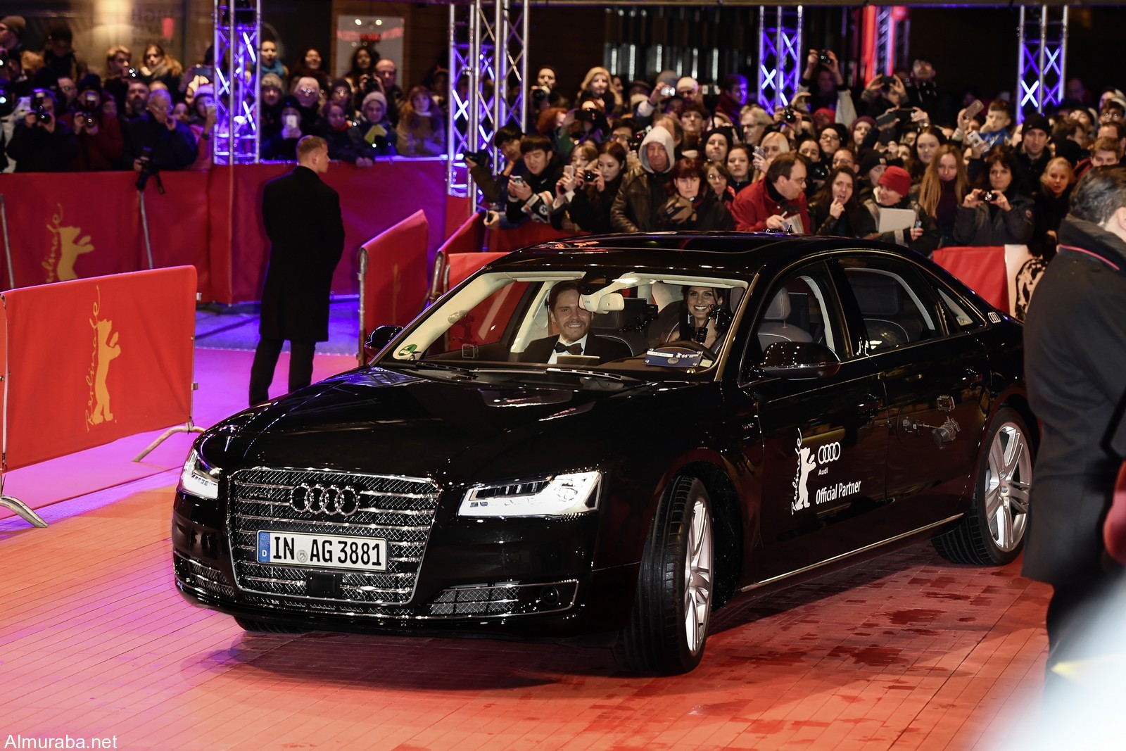 A piloted driving Audi A8 L W12 brings Daniel Brühl and his girlfriend Felicitas Rombold to the red carpet