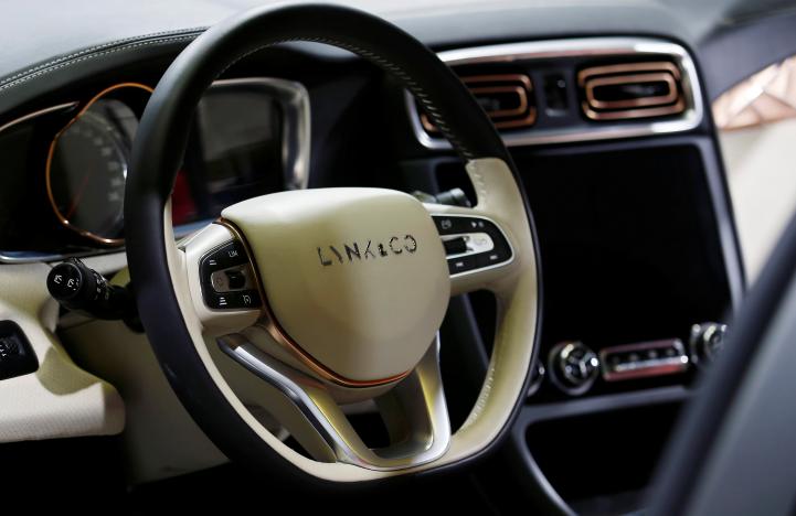 The logo of Lynk & Co is pictured on a steering wheel during the unveiling of the Chinese automaker Geely's first model Lynk & Co in Berlin, Germany, October 20, 2016. REUTERS/Hannibal Hanschke
