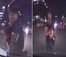 "فيديو" شاهد رجل صيني يقوم بإلقاء نفسه وطفله الرضيع أمام سيارة مسرعة 5