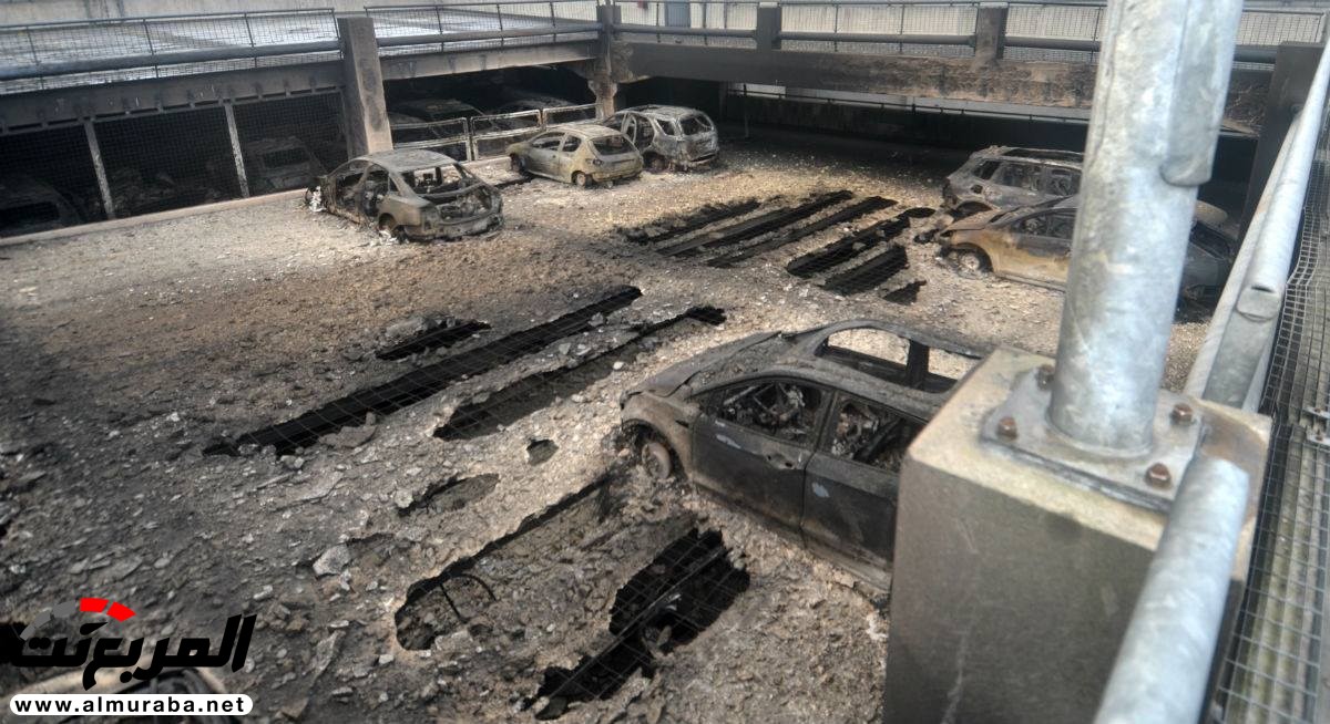 "بالفيديو والصور" 1,400 سيارة دمرت بالكامل بحريق مرآب في ليفربول 11