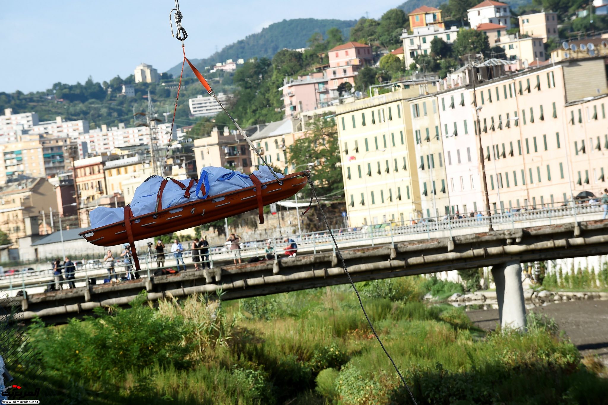 "بالصور" 39 قتيلا حصيلة ضحايا انهيار جسر جنوة الإيطالي 25