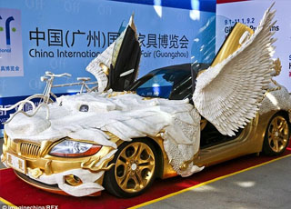 "بالصور" تحويل سيارة بي إم دبليو زد فور إلى تنين ضخم بلون ذهبي في الصين BMW Z4 6