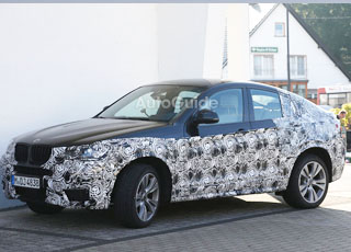 تسريب صور بي ام دبليو اكس فور 2015 الجديدة كلياً بجانب شقيقتها الأقدم اكس ثري BMW X4 2015 1